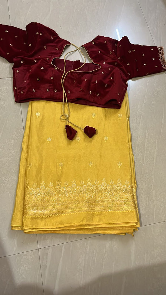 Yellow Tissue saree with pink velvet blouse